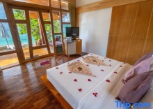 Бунгало beachfront в Bundhaya Villas Koh Lipe