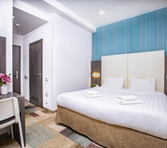 Делюкс с кроватью KING SIZE для 2 гостей в Мио