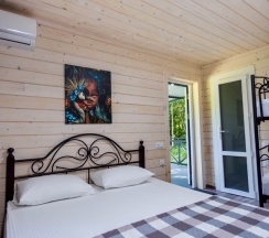 Домик в лесу в Villa la vita