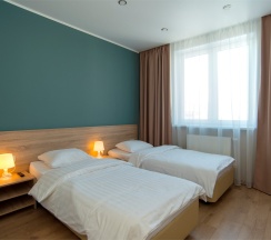 Апартаменты с гостиной и 2 спальнями. Вид на реку Казанку и аквапарк "Ривьера" в Sibgat Apartments