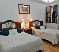 Четырёхместный номер Standard 2 отдельные кровати в Hotel Aitana Oaxaca