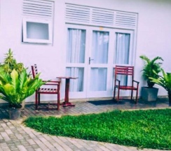 Двухместный номер Standard с видом на сад двуспальная кровать в Jasmine Garden Beach Guest House
