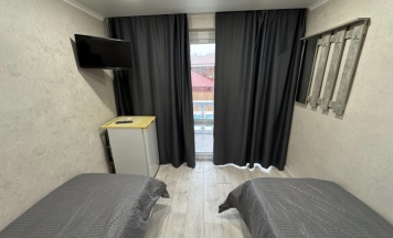 Двухместный номер 2 этаж Эконом двуспальная кровать в Ninel