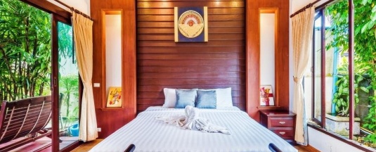 Люкс с видом на воду в Assada Boutique Hotel Kata Phuket
