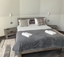 Двухместный люкс двуспальная кровать в Ушба