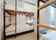 Кровать в общем номере в The Yard Hostel