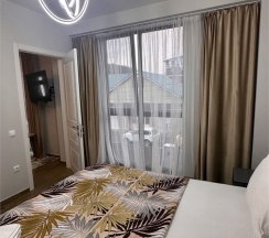 Апартаменты двухкомнатные четырехместные (улучшенные) без балкона в Polikariya