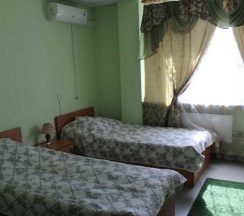 Комната эконом с 2 односпальными кроватями в Визит