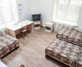 Кровать в 4-местном общем номере в Smart Hotel KDO Саранск
