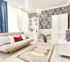 Четырёхместные апартаменты с балконом и с видом на город в Апартаменты Проспект Независимости 52