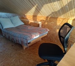 Шале на берегу в деревне в Центр туризма