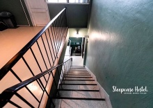 Кровать в общем номере в Sleepcase Hostel