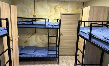 Кровать в 6-местном общем женском номере в Точка
