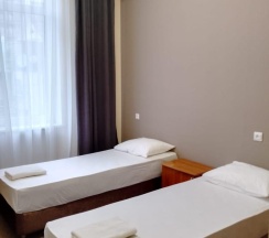 Номер полулюкс с 2 односпальными кроватями в Оптима