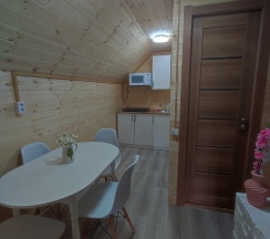Семейный четырехместный номер с кухней в Легенда Тайги