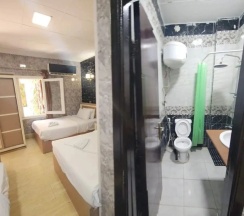Трёхместный номер Comfort с 3 комнатами с видом на город в Отель Cairo