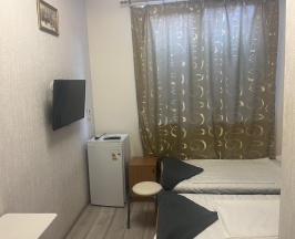 Комната эконом с 2 односпальными кроватями в Олимп Хаус