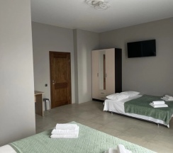 Двухместный люкс с балконом и с видом на горы двуспальная кровать в Maximus