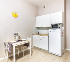 Улучшенная студия с кроватью king size и балконом в Pulkovo Apart