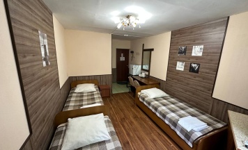 Трехместный номер с 3 односпальными кроватями в Улисс