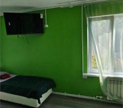 Кровать в общем номере в Камчатдар