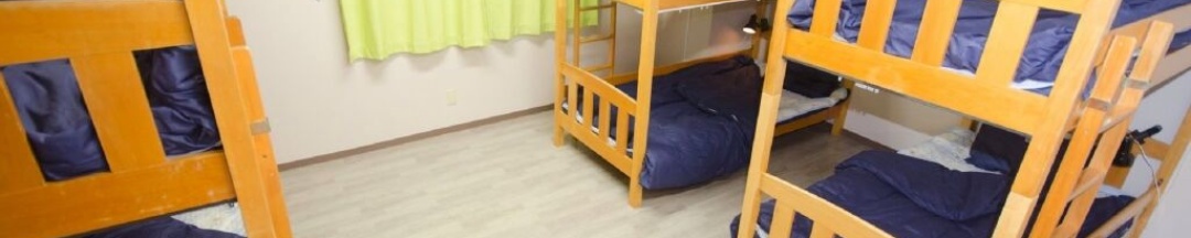 Кровать в общем номере (мужской номер) в Tokyo Sumidagawa Youth Hostel