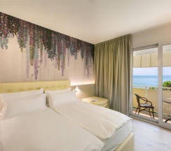 Двухместный номер Standard с видом на море двуспальная кровать в Hotel Le Lampare