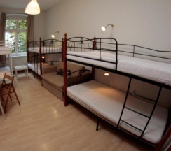 Кровать в общем номере в Pit Stop Hostel