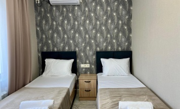 Комната люкс с 2 односпальными кроватями в Южный вайб