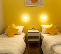 Стандартный двухместный номер с двумя отдельными кроватями с удобствами в блоке в Лимонад