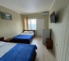 Четырёхместный стандарт с видом на море в Дежавю