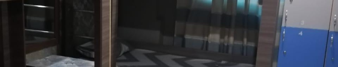 Кровать в 4-местном общем номере в Жара