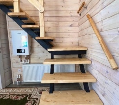 Двухместный коттедж с красивым видом из окна двуспальная кровать в Elki Domiki