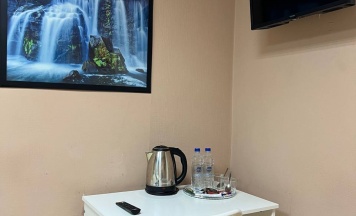 Двухместный номер с 2 раздельными кроватями и общей ванной комнатой в Берёза