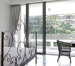 Двухместный номер Deluxe с балконом двуспальная кровать в Surintra Boutique Resort