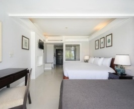 Двухместный номер Deluxe Terrace Lagoon с балконом и с видом на бассейн двуспальная кровать в Thavorn Palm Beach Resort Phuket