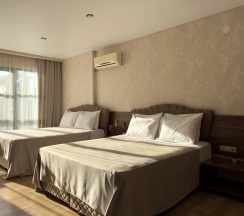 Четырёхместный Сьют c 1 комнатой с балконом и с видом на море в Aimara