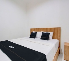 Двухместный номер Deluxe двуспальная кровать в Capital O 93266 Palmier Hotel