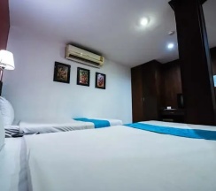 Двухместный номер без окна Deluxe 2 отдельные кровати в Arawana Express Chinatown