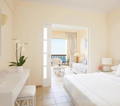Номер семейный с видом на сад в Grecotel Marine Palace & Aqua Park