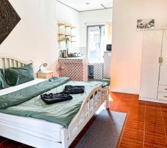 Студия с балконом в Amy Village Garden Resort