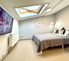 Апартаменты №10 "Люкс" на мансардном этаже в Саквояж