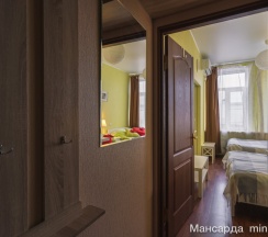 Четырех местный стандарт с двумя двухспальными кроватями в Мансарда