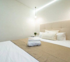 Двухместные апартаменты с балконом и с видом на город двуспальная кровать в Апартаменты с круглосуточным заселением 24/7