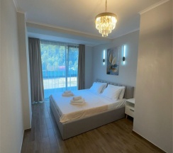 Апартаменты двухкомнатные четырехместные (улучшенные) без балкона в Polikariya