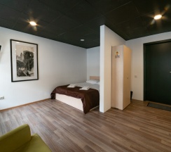 СЕМЕЙНЫЙ НОМЕР с общей ванной комнатой в Proloft city hostel&rooms