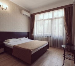 Люкс с 2 комнатами в Олимпия