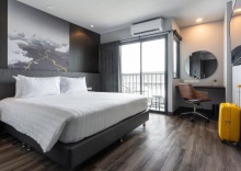 Двухместный номер Standard с балконом двуспальная кровать в Sleep Mai Airport Lifestyle Hotel