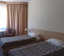 Номер полулюкс семейный с 4 односпальными кроватями в Печора