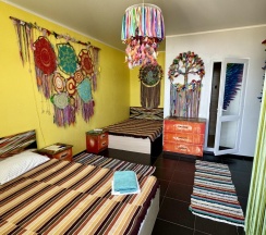 Кровать в 2-местном общем номере Шаман в Дом Радости